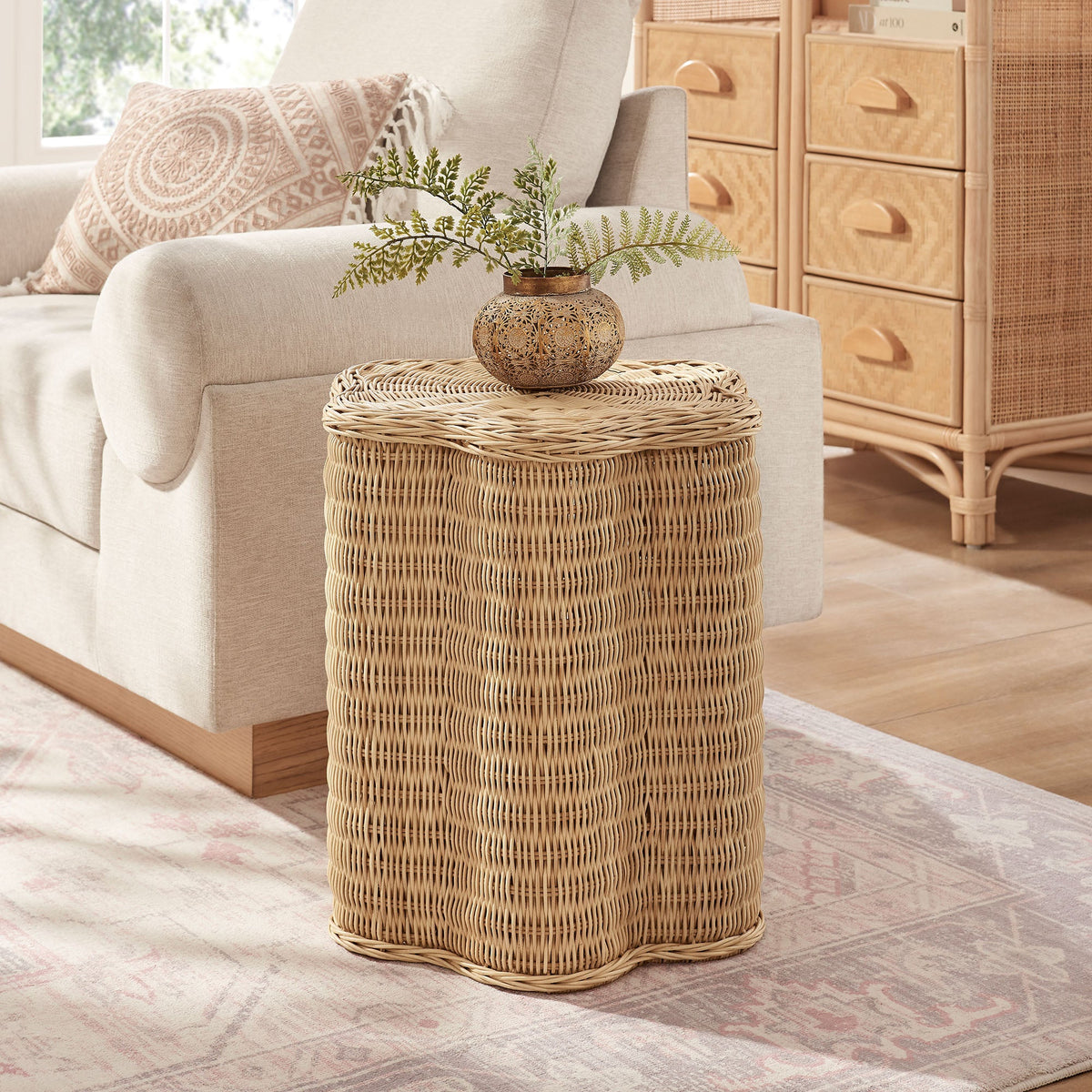 Erika Scalloped Natural Rattan Side Table with round woven base and fern vase on Tampa Home & Garden Store