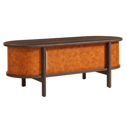 Coralie curved vegan leather oval coffee table with dark wood top and orange sides HouseOfZazla on Tampa Home & Garden Store
