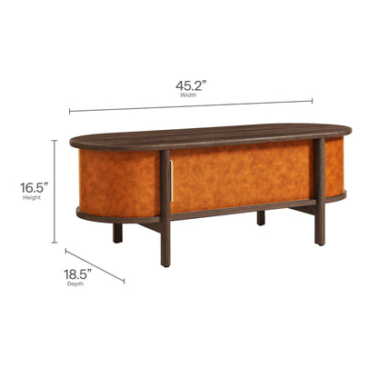 Coralie curved vegan leather oval coffee table in warm brown with dark wood legs on Tampa Home & Garden Store