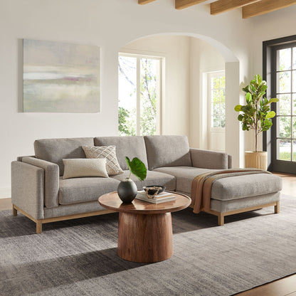 Roscoe right-facing fabric sectional sofa with chaise in light gray with wood legs on Tampa Home & Garden Store