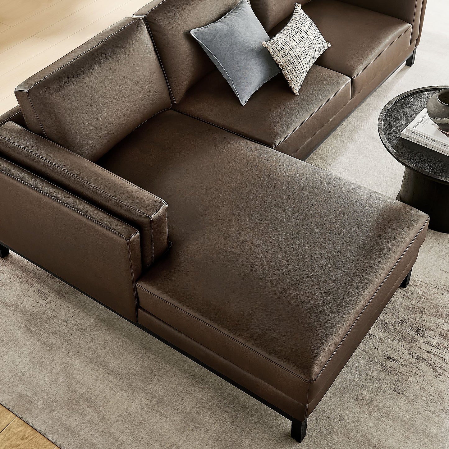 Roscoe left-facing vegan leather sectional sofa with chaise, dark brown, blue-gray and beige pillows on Tampa Home & Garden Store