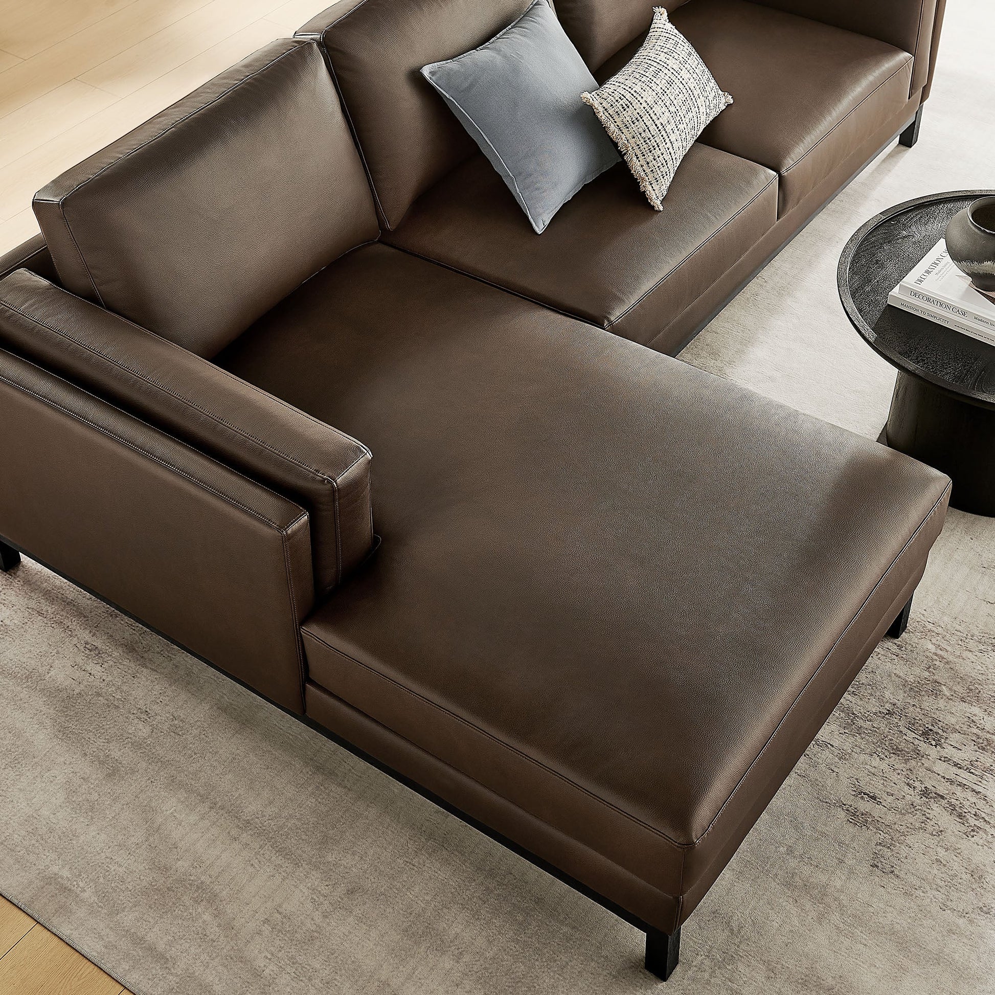 Roscoe left-facing vegan leather sectional sofa with chaise, dark brown, blue-gray and beige pillows on Tampa Home & Garden Store