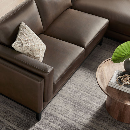 Roscoe right-facing vegan leather sectional sofa with chaise in brown, stitched edges on Tampa Home & Garden Store