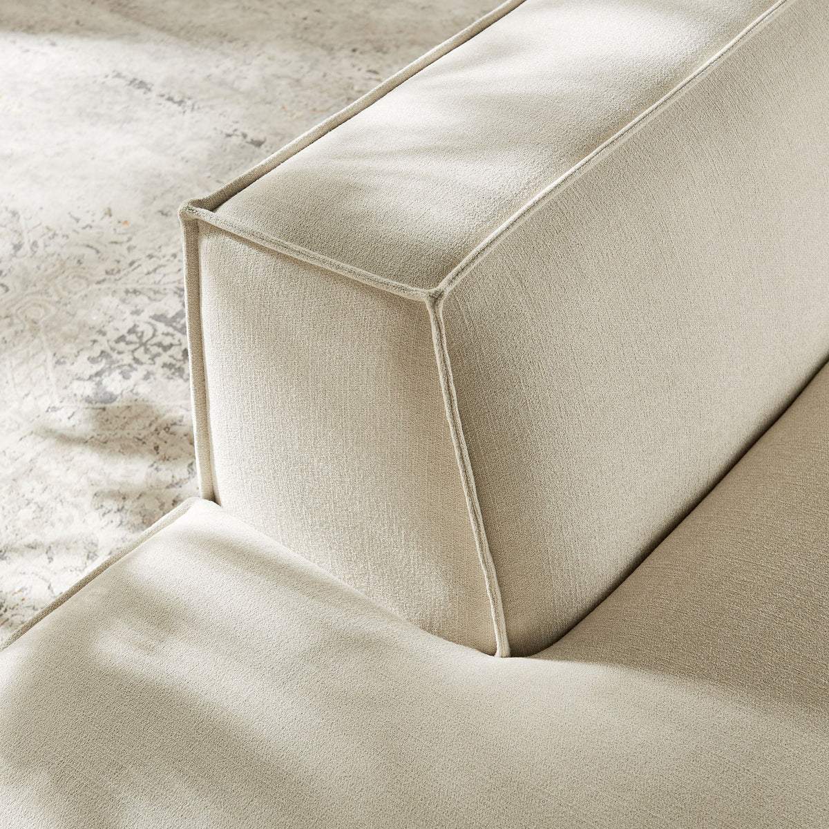 Restore Performance Fabric Upholstered Left-Facing Armless Modular Chaise close-up in beige on Tampa Home & Garden Store