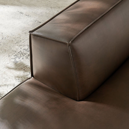 Restore vegan leather left-facing armless modular chaise with brown textured upholstery on Tampa Home & Garden Store