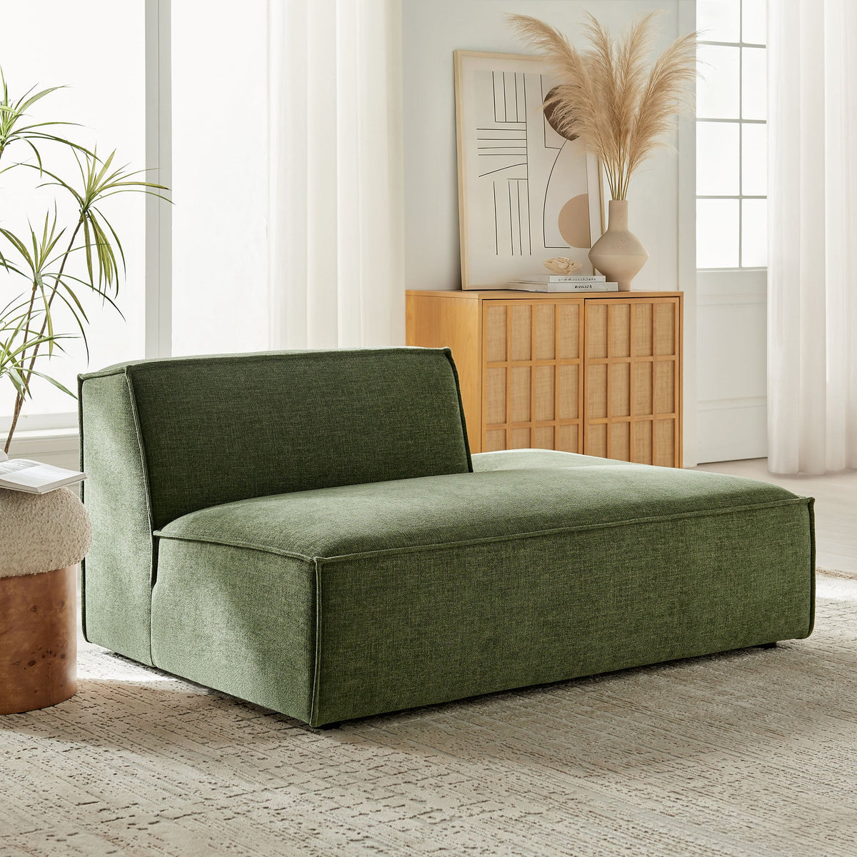 Right-facing armless modular chaise in green performance fabric upholstery on Tampa Home & Garden Store