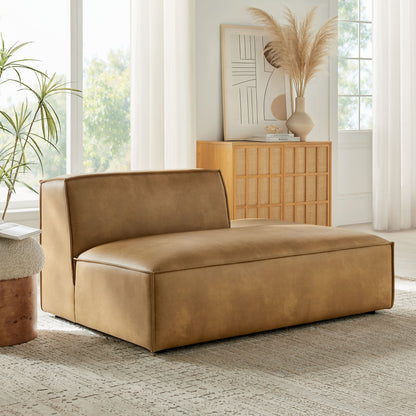 Restore Vegan Leather Right-Facing Armless Modular Chaise in tan with clean seams in living room on Tampa Home & Garden Store