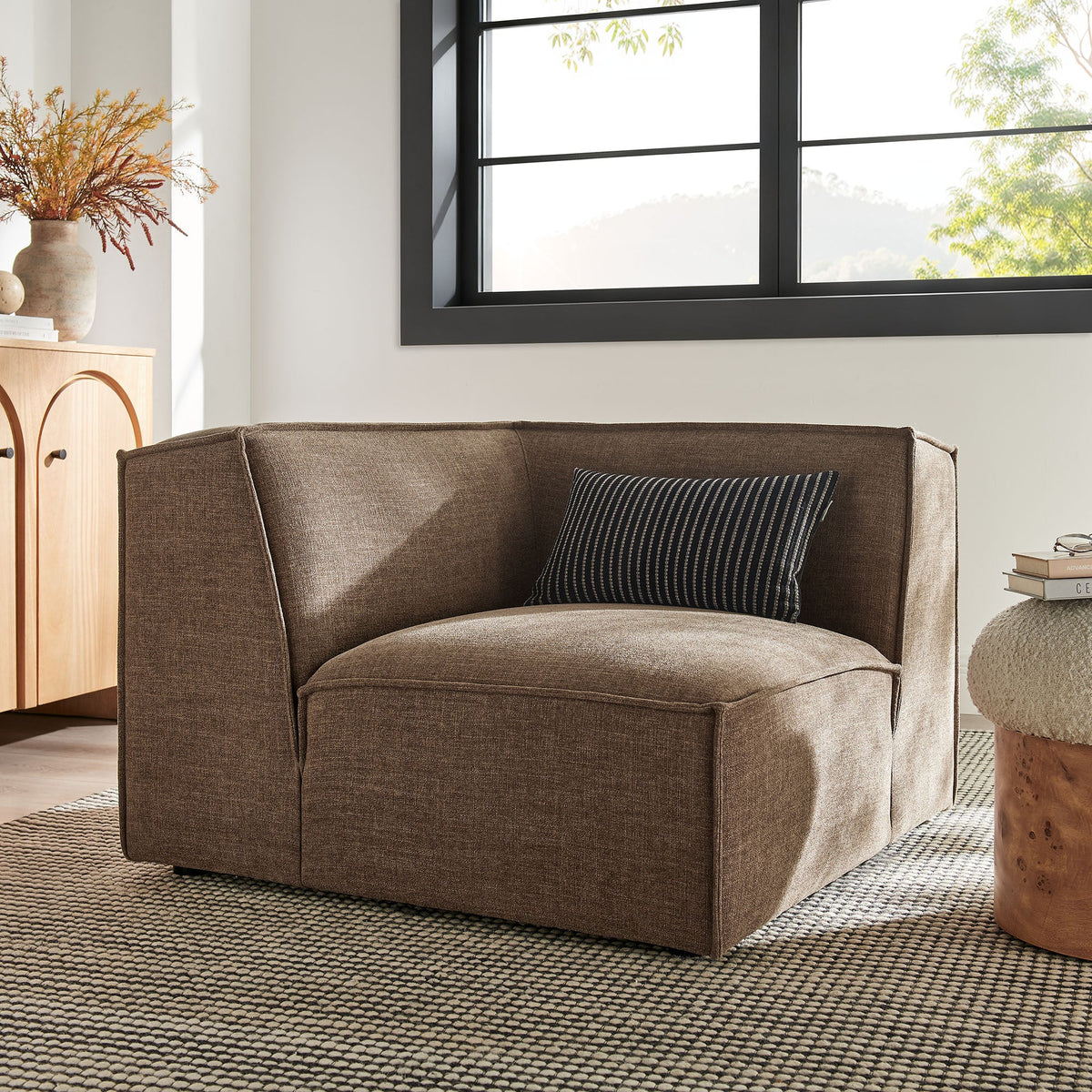 Modular corner chair in brown performance fabric on Tampa Home & Garden Store