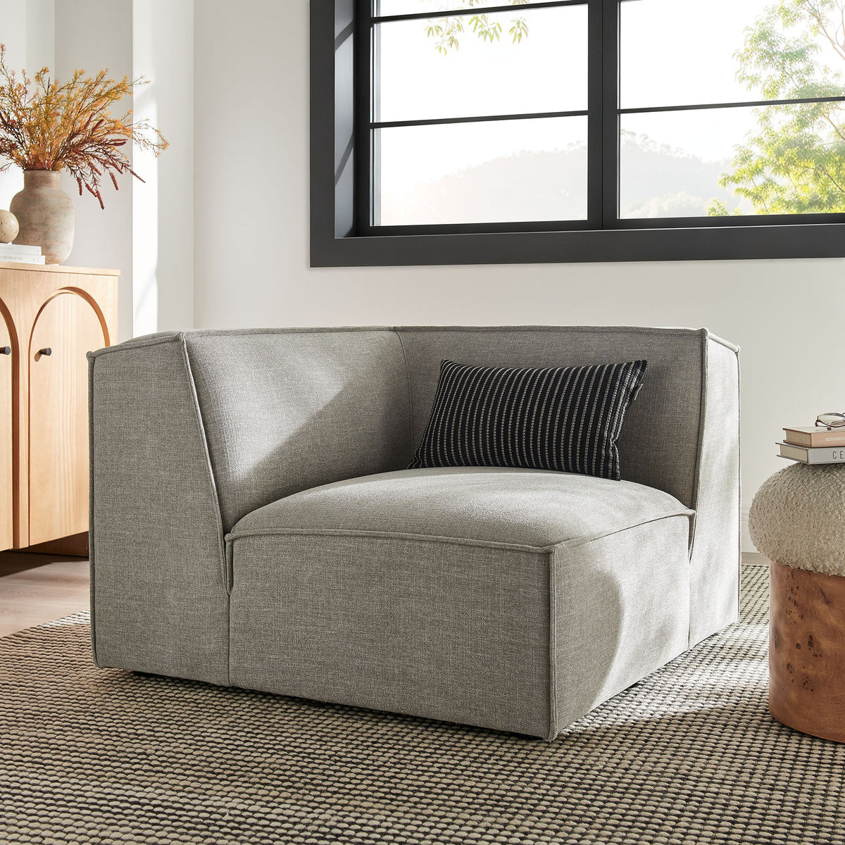 Modway Restore Performance fabric upholstered modular corner chair in gray with striped pillow on Tampa Home & Garden Store