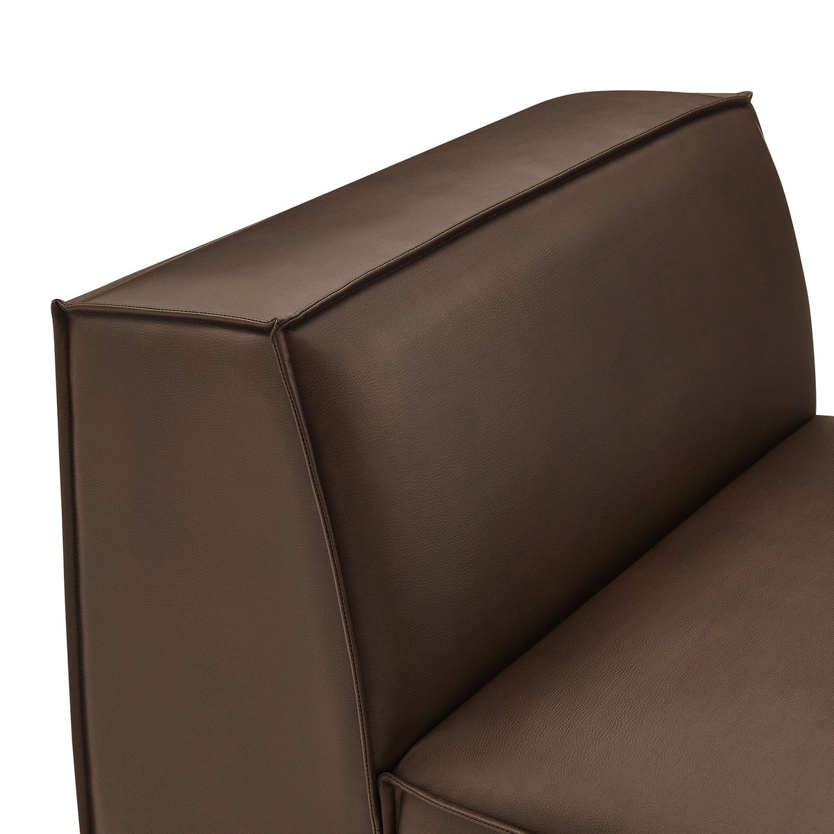 Restore vegan leather armless modular chair brown close-up showing stitched seam on Tampa Home & Garden Store