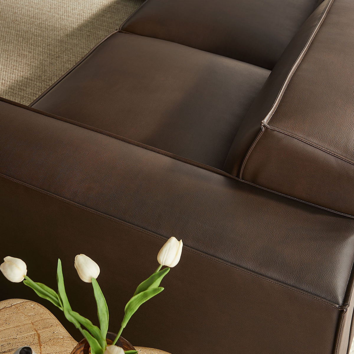 Restore 5-Piece Vegan Leather Modular L-Shaped Sofa brown vegan leather upholstery close-up on Tampa Home & Garden Store