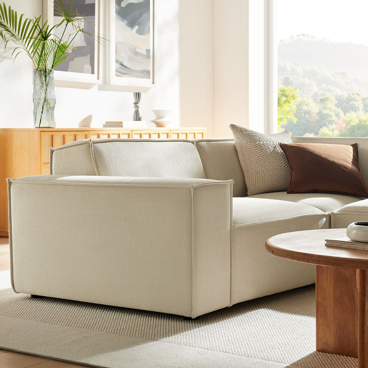 Restore 3-piece modular L-shaped sectional sofa in ecru beige fabric with ottoman on Tampa Home & Garden Store