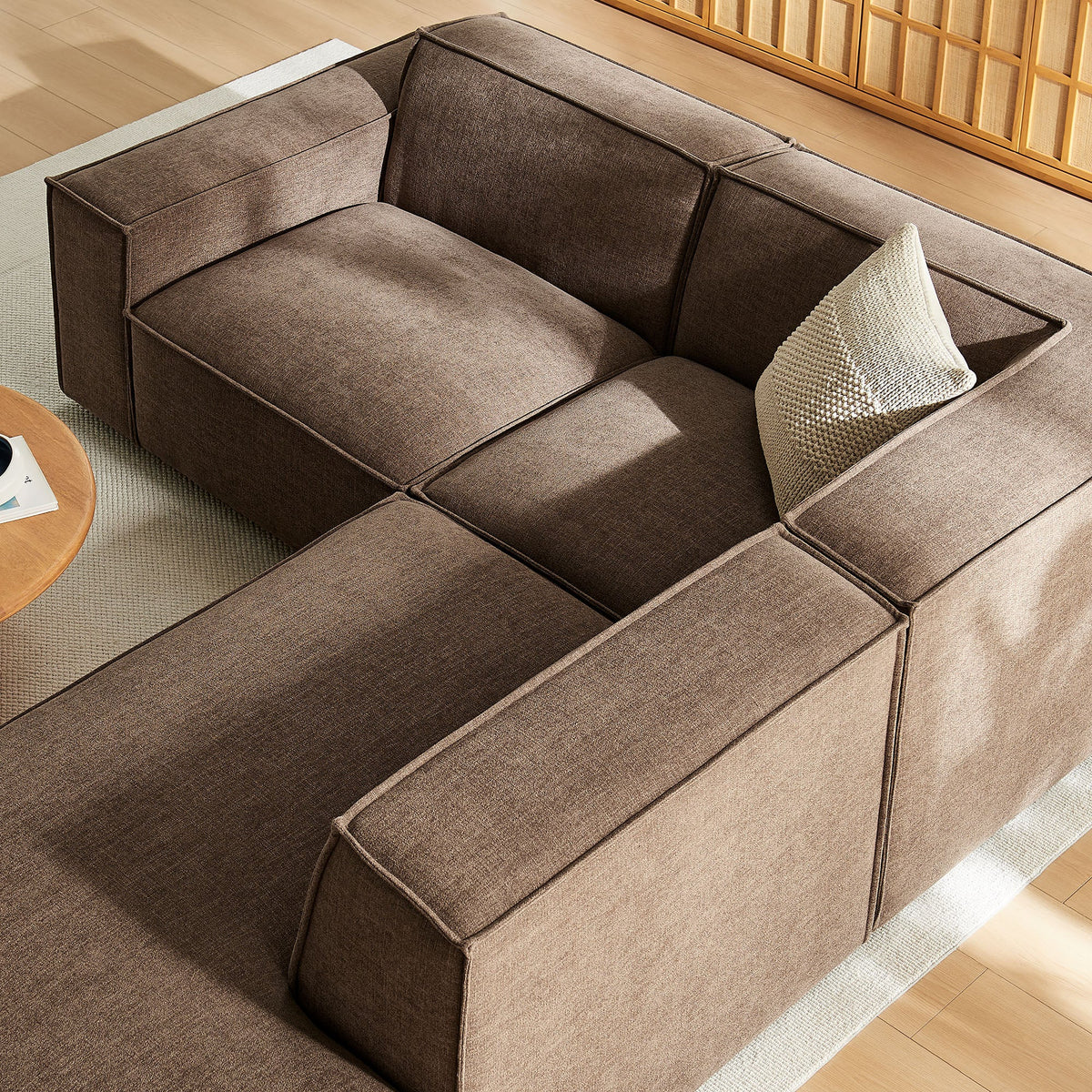 Restore 3-Piece modular sectional sofa in mocha performance fabric with cream pillow on Tampa Home & Garden Store