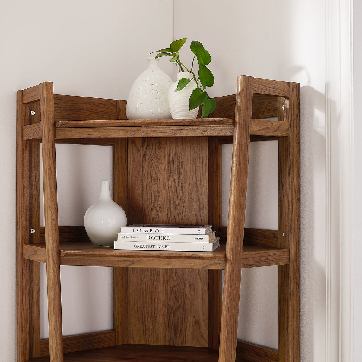 Bixby 71in Corner Bookshelf by Modway in walnut wood with two white vases and plant on top on Tampa Home & Garden Store