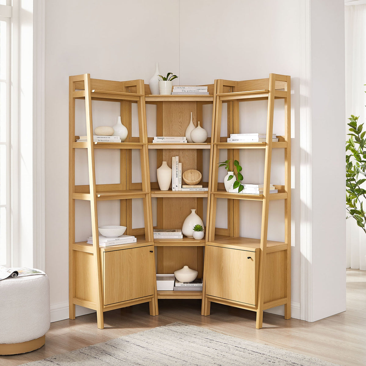 Bixby 3-piece corner bookshelf set by Modway in light oak finish; narrow shelves with books, white ceramic vases and a plant on Tampa Home & Garden Store