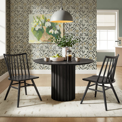 Alvar Spindle Back Dining Side Chairs set of 2 in black wood around a pedestal table on Tampa Home & Garden Store