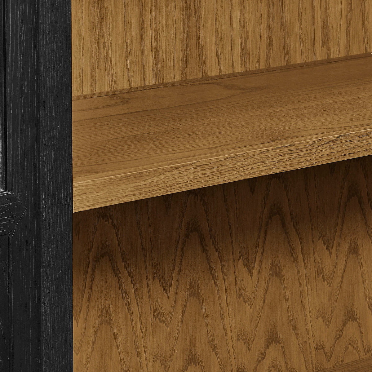 Anwen solid wood display cabinet close-up of natural wood grain with black framing on Tampa Home & Garden Store