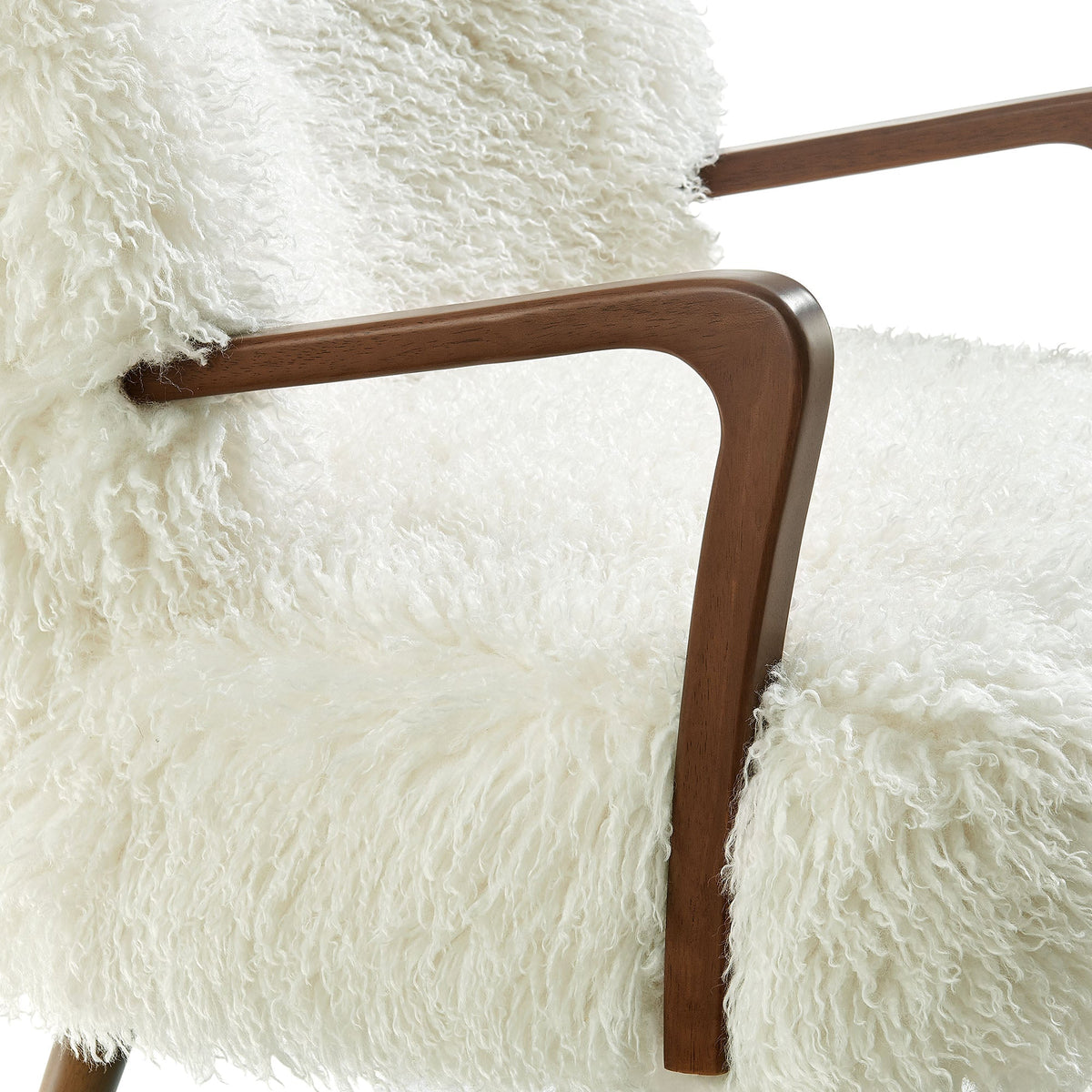 Zerra faux shearling accent armchair with white fluffy upholstery and brown wood frame on Tampa Home & Garden Store