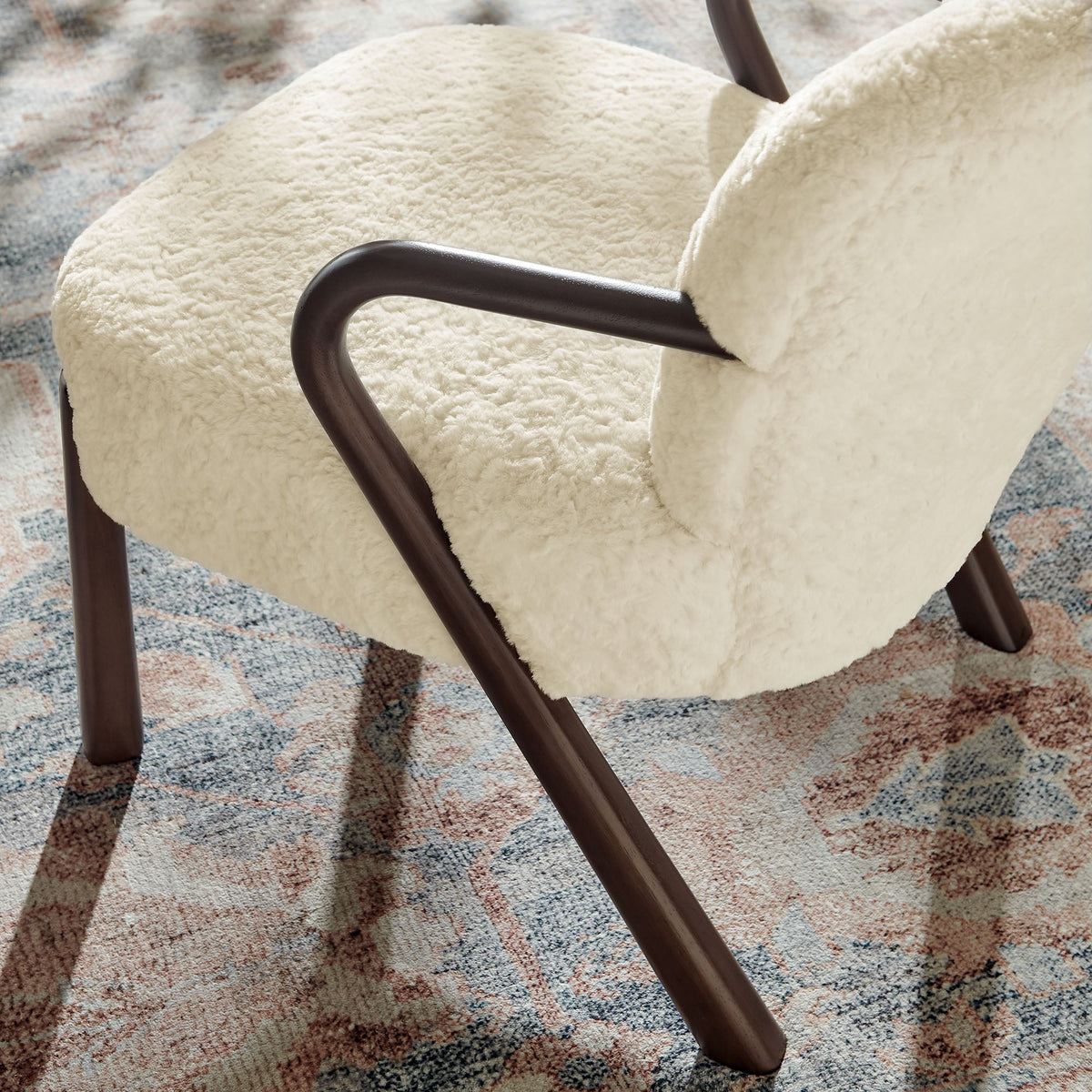 Arden Faux Shearling Accent Armchair with cream fluffy upholstery and dark wood frame on Tampa Home & Garden Store