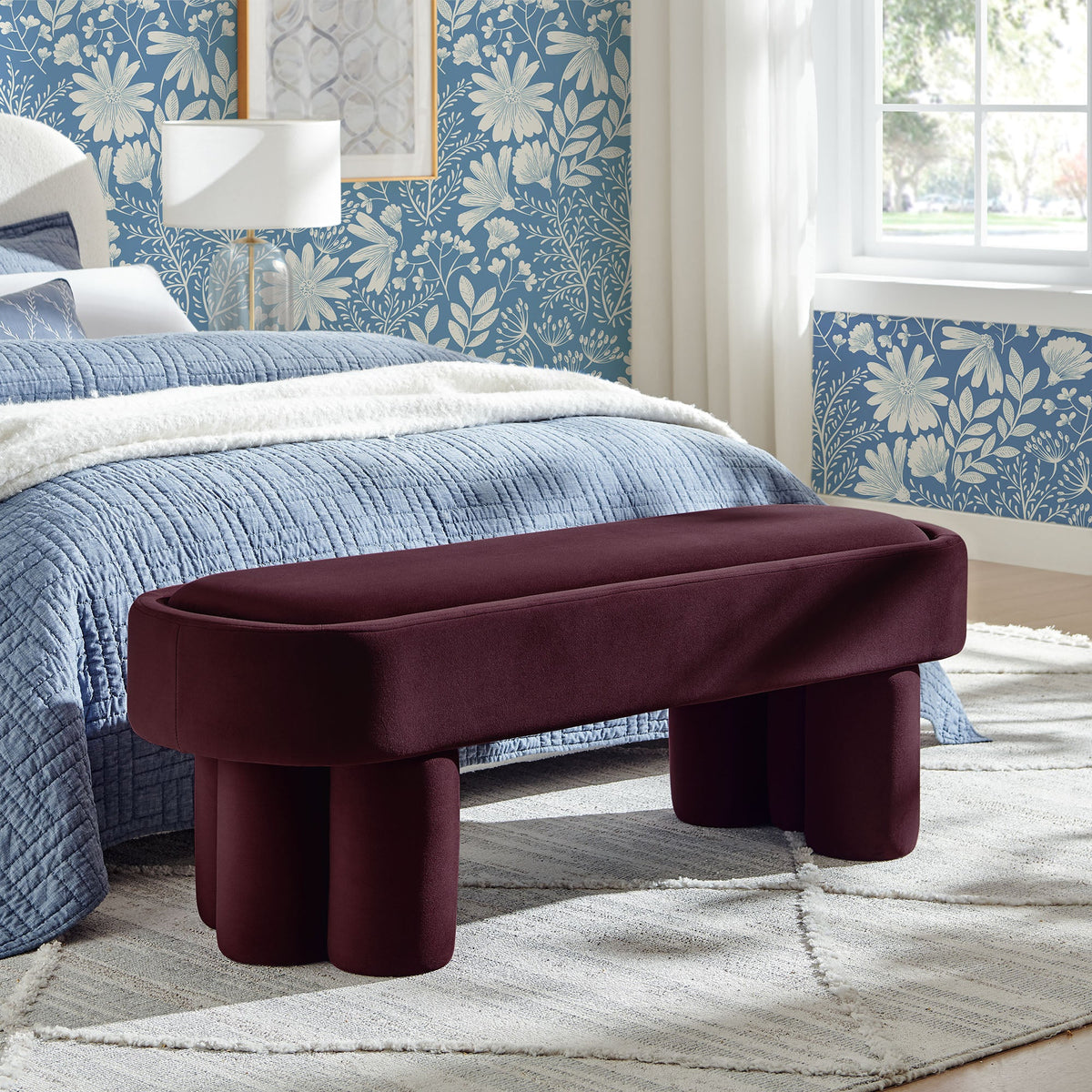 Mossi Oval Velvet Accent Bench burgundy at foot of bed in blue floral wallpaper by HouseOfZazla on Tampa Home & Garden Store
