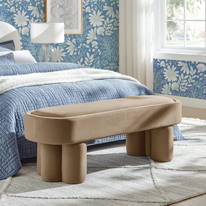 Mossi Oval Velvet Accent Bench beige upholstery with rounded legs in blue floral wallpaper on Tampa Home & Garden Store