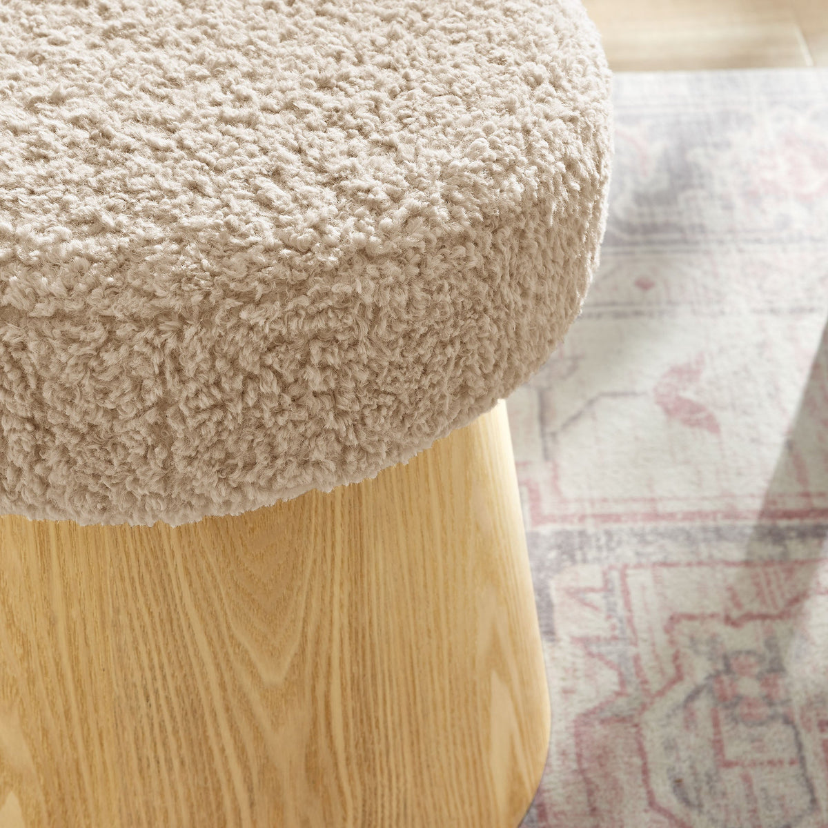 Ketra Round Faux Shearling Ottoman Footstool in beige with wooden legs on Tampa Home & Garden Store