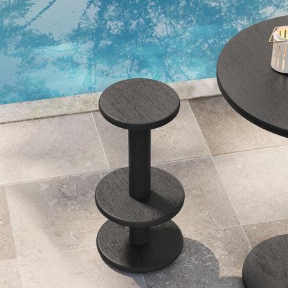 Neo 15-inch round indoor-outdoor wood bar stools with black finish beside round table poolside on Tampa Home & Garden Store