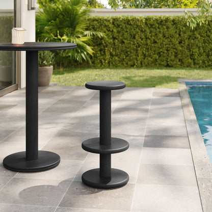 Neo 15-inch round indoor-outdoor wood bar stools set of two in black on patio by pool on Tampa Home & Garden Store