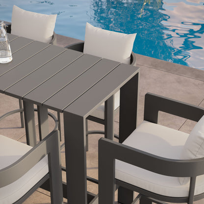 Tahoe 5-Piece Outdoor Patio Bar Table Set with gray slat table and white cushions poolside on Tampa Home & Garden Store