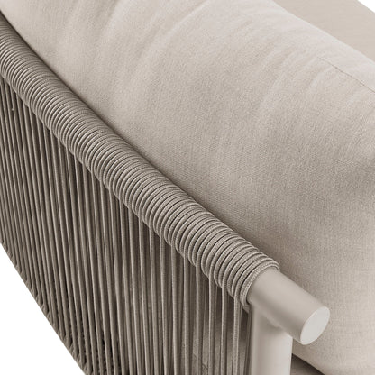 Porta armless outdoor aluminum modular sofa piece in beige fabric with rope-wrapped edge detail on Tampa Home & Garden Store