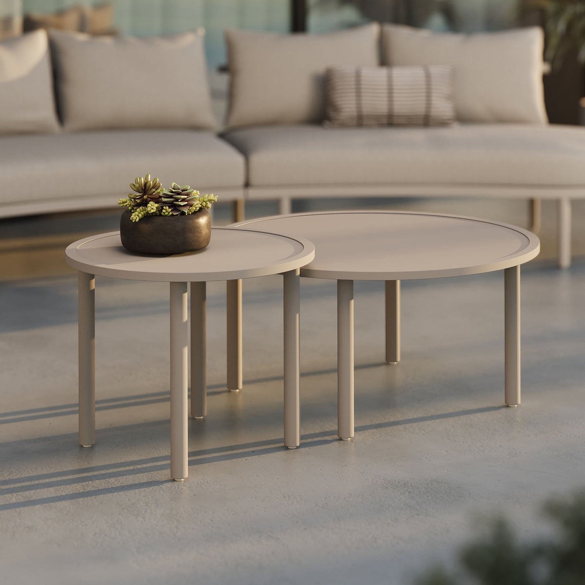 Porta 2-Piece Nesting Outdoor Patio Round Aluminum Coffee Tables with succulent centerpiece on Tampa Home & Garden Store