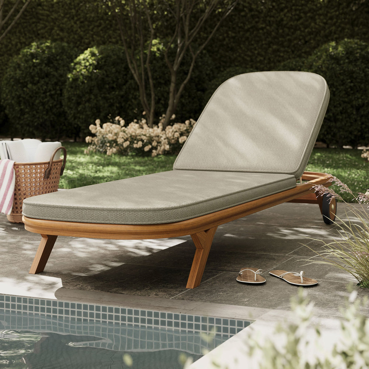 Kona outdoor teak wood chaise lounge chair with beige cushion poolside on Tampa Home & Garden Store