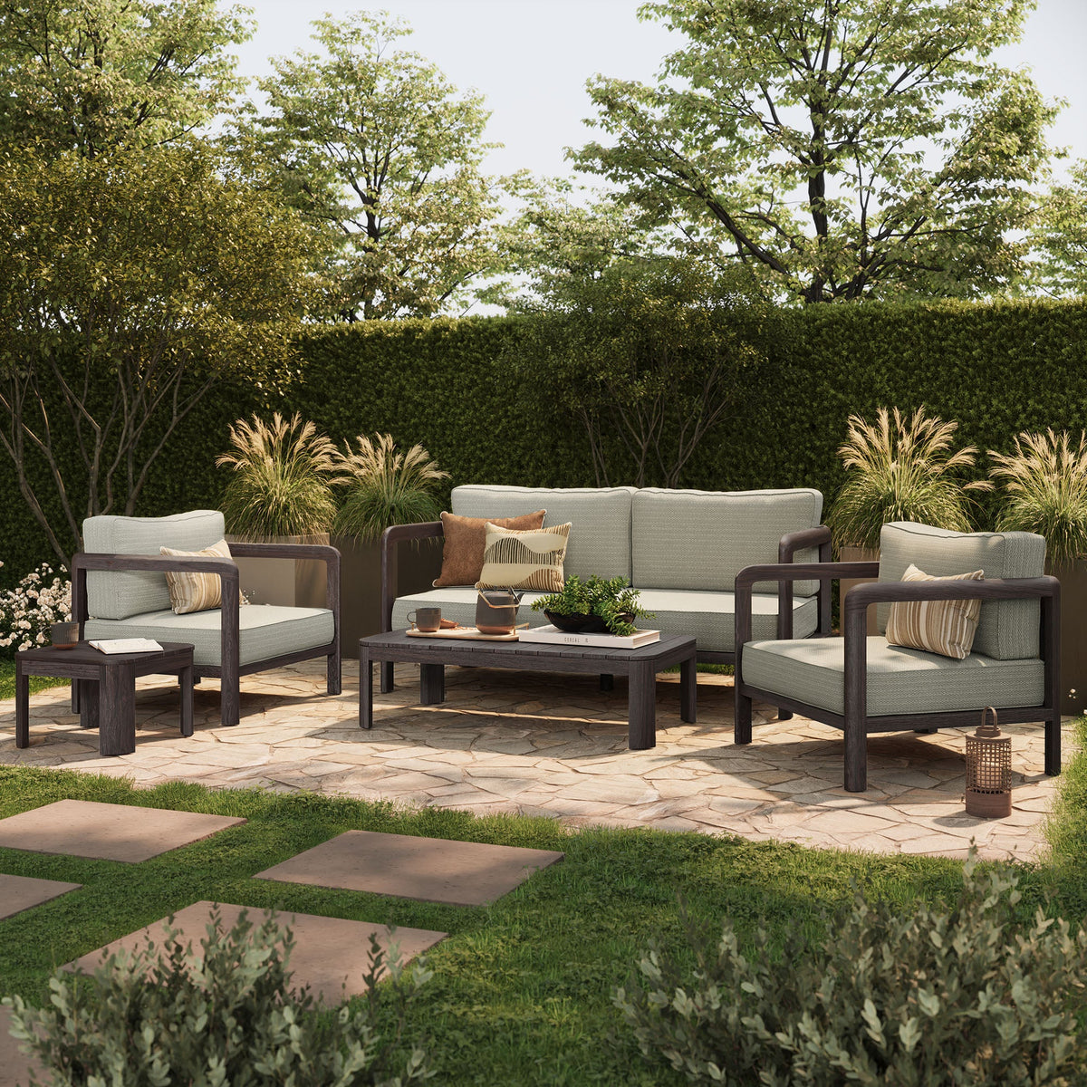 Kona 5-Piece outdoor teak wood set with light gray cushions on a patio lounge with a table on Tampa Home & Garden Store