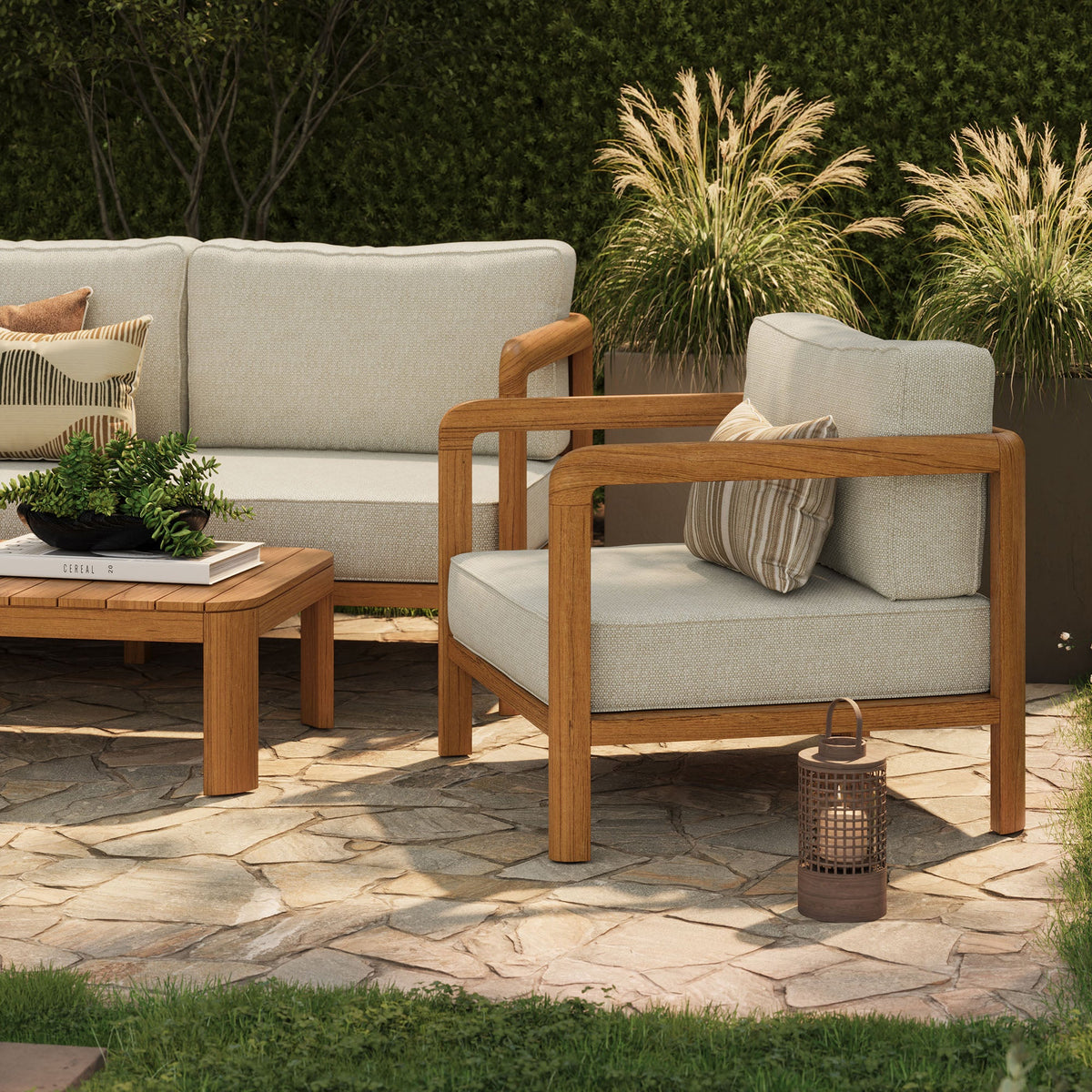 Kona 5-Piece Outdoor Teak Wood Sofa Set with beige cushions and teak frame on a stone patio on Tampa Home & Garden Store