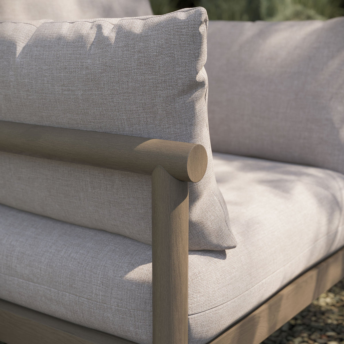Eleni outdoor teak wood armchair with beige textured cushions on Tampa Home & Garden Store