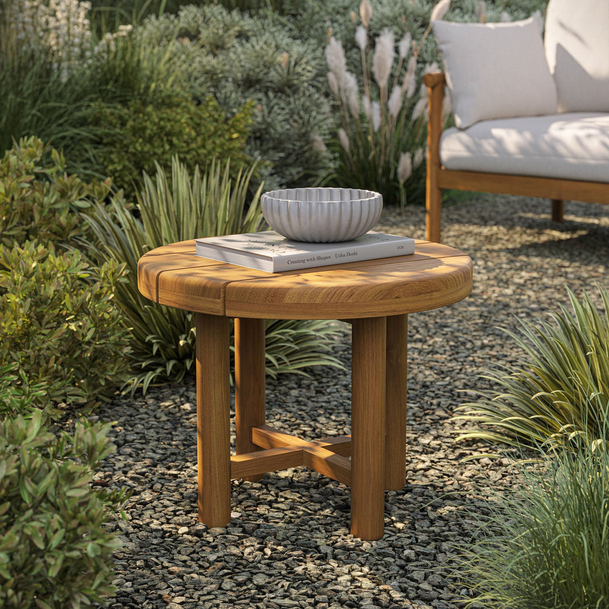 Eleni 20-inch round teak outdoor side table by Modway with a gray ceramic bowl atop a book on Tampa Home & Garden Store