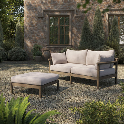 Eleni 2-Piece Outdoor Teak Wood Loveseat with Ottoman beige cushions on stone patio on Tampa Home & Garden Store