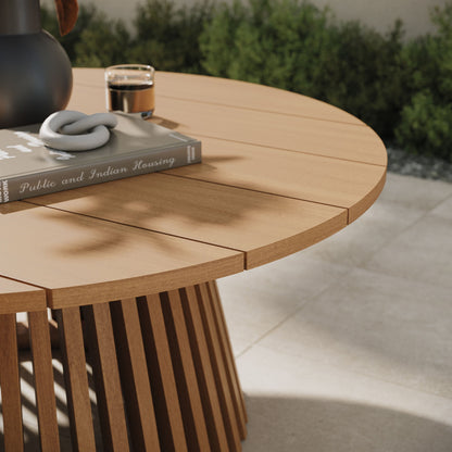 Lane Round Outdoor Teak Wood Coffee Table with slatted pedestal base on patio on Tampa Home & Garden Store