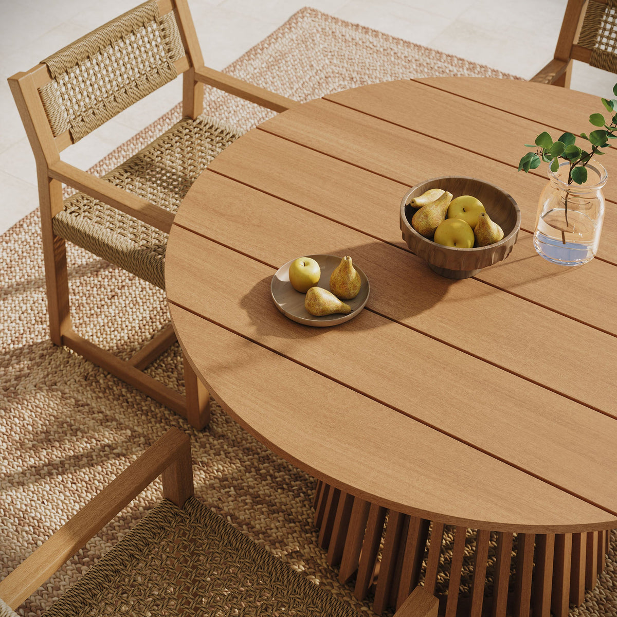 Lane Round Outdoor Patio Teak Wood Dining Table with natural finish and woven-back chairs on Tampa Home & Garden Store