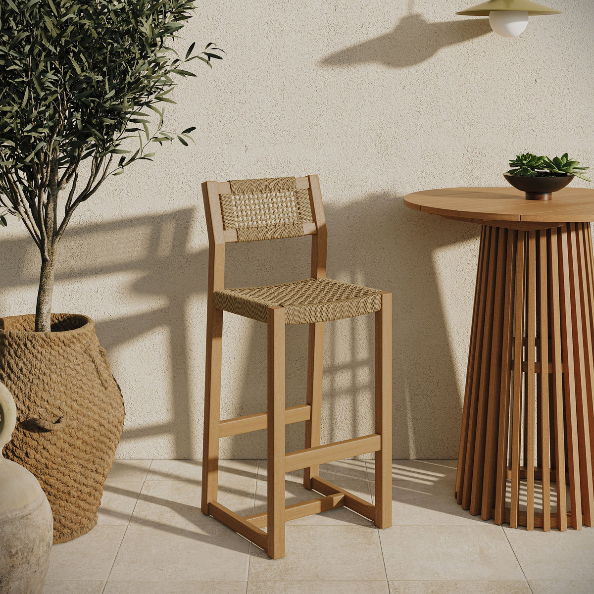 Reed 44in teak wood rattan outdoor bar stool with woven seat and natural wood frame on Tampa Home & Garden Store