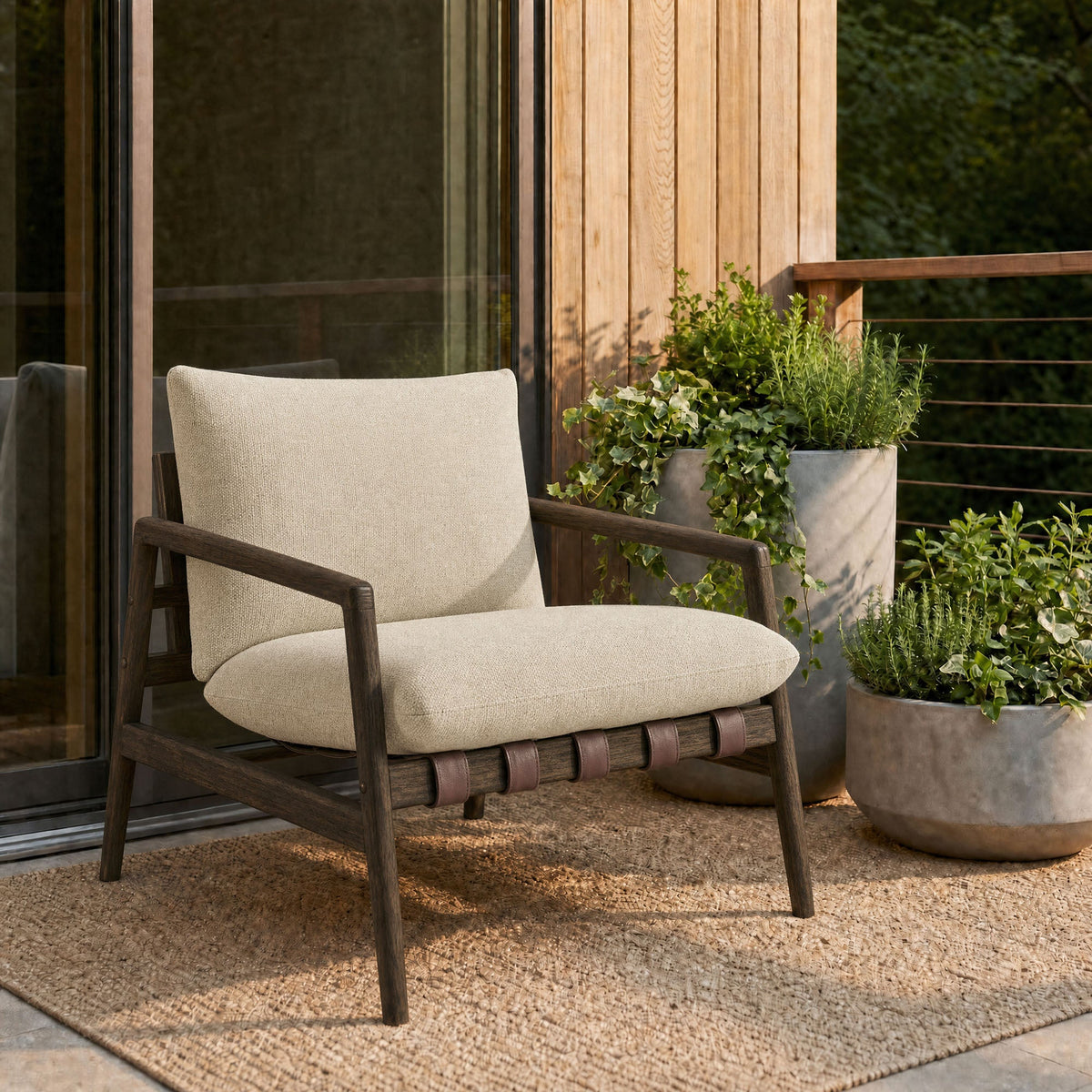 Nomi Outdoor Patio Teak Wood Sling Chair with Beige Cushion on a Wooden Deck on Tampa Home & Garden Store