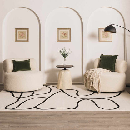 Eilir Modern Low Profile Boho Rug in cream with black abstract lines by Boutique Rugs on Tampa Home & Garden Store