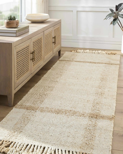Errin Jute Area Rug by Boutique Rugs in natural beige jute with woven fringe on Tampa Home & Garden Store
