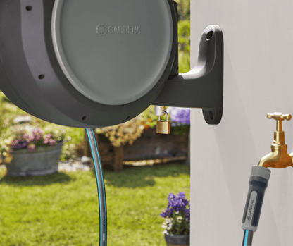 Gardena RollUp 50 ft retractable hose reel, wall-mounted, auto retracting with blue hose on Tampa Home & Garden Store