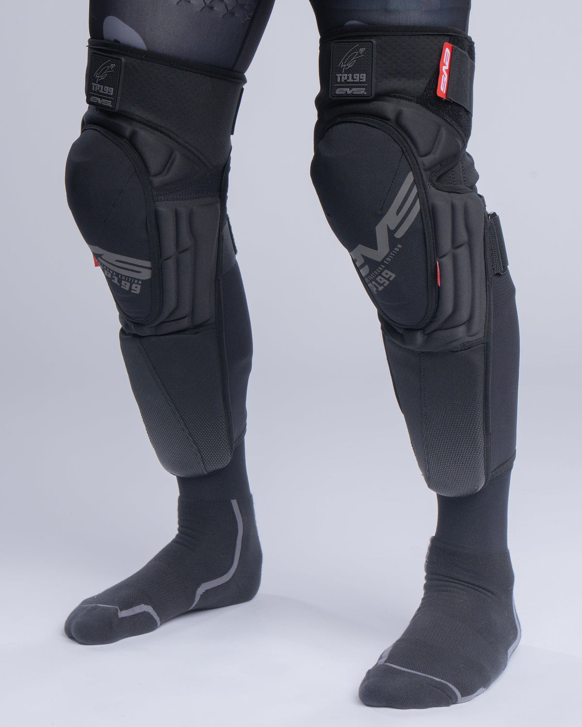 EVS Sports TP199 Blackout Knee Guard pair with padded knee protection and Velcro straps on Tampa Home & Garden Store
