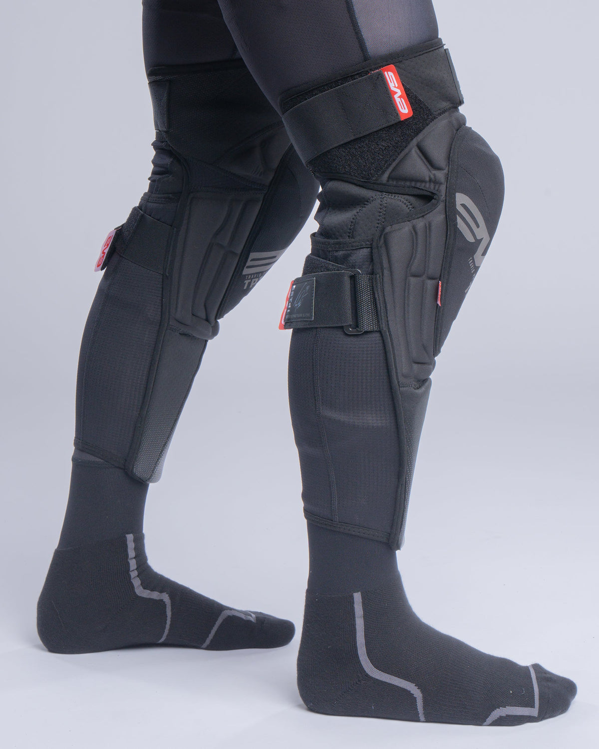 TP199 Blackout Knee Guard pair by EVS Sports, black knee braces with straps on Tampa Home & Garden Store