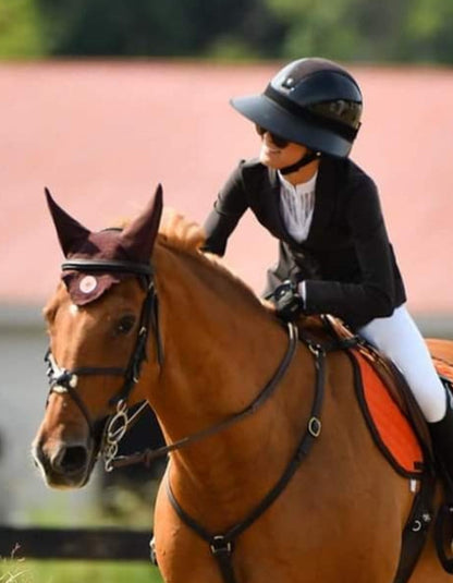EquiVisor® Sport sun visor on horseback rider in black jacket and helmet on Tampa Home & Garden Store