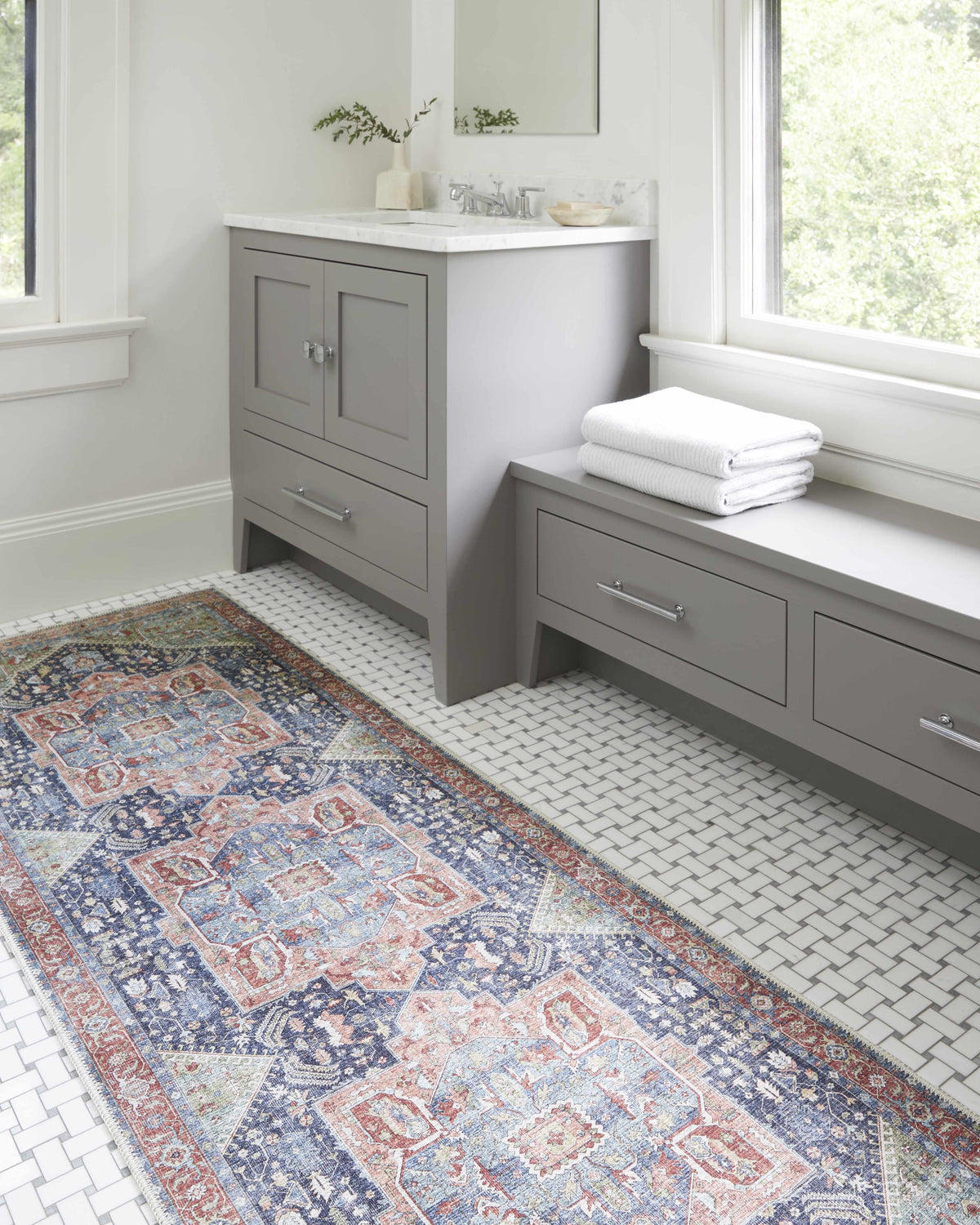 Exira washable area rug by Boutique Rugs with blue and red oriental motif in bathroom on Tampa Home & Garden Store