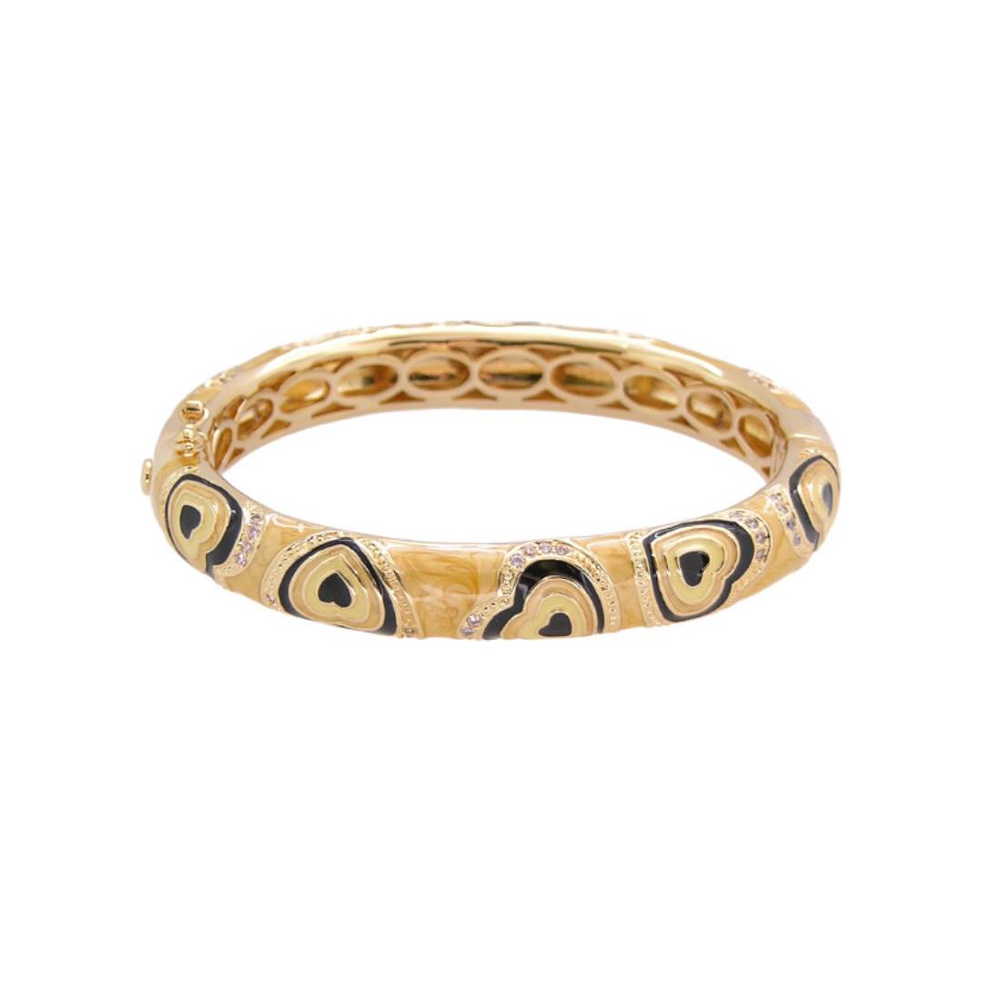 Retro Hearts Bangle by Lauren G Adams, goldtone heart motif hinged bracelet with safety lock on Tampa Home & Garden Store