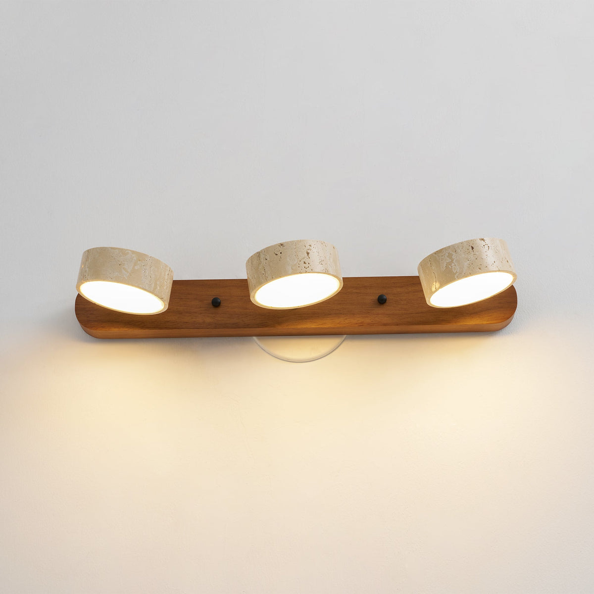 Travertine stone wall sconce with dimmable LED and three cylindrical shades on Tampa Home & Garden Store